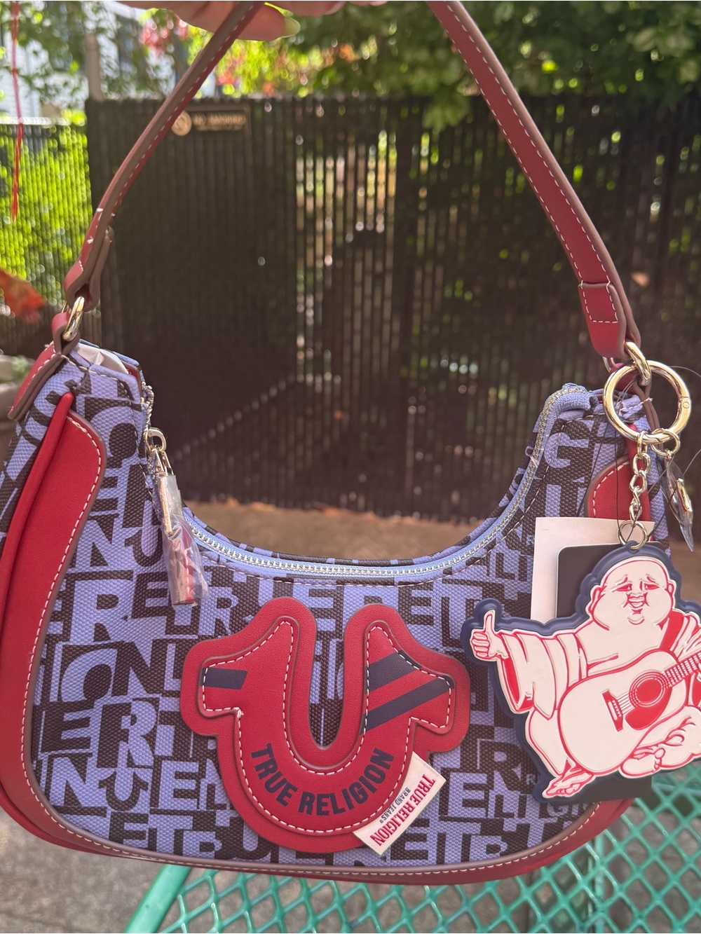 True Religion red and purpleish/blue purse with Budah charm   #hobo